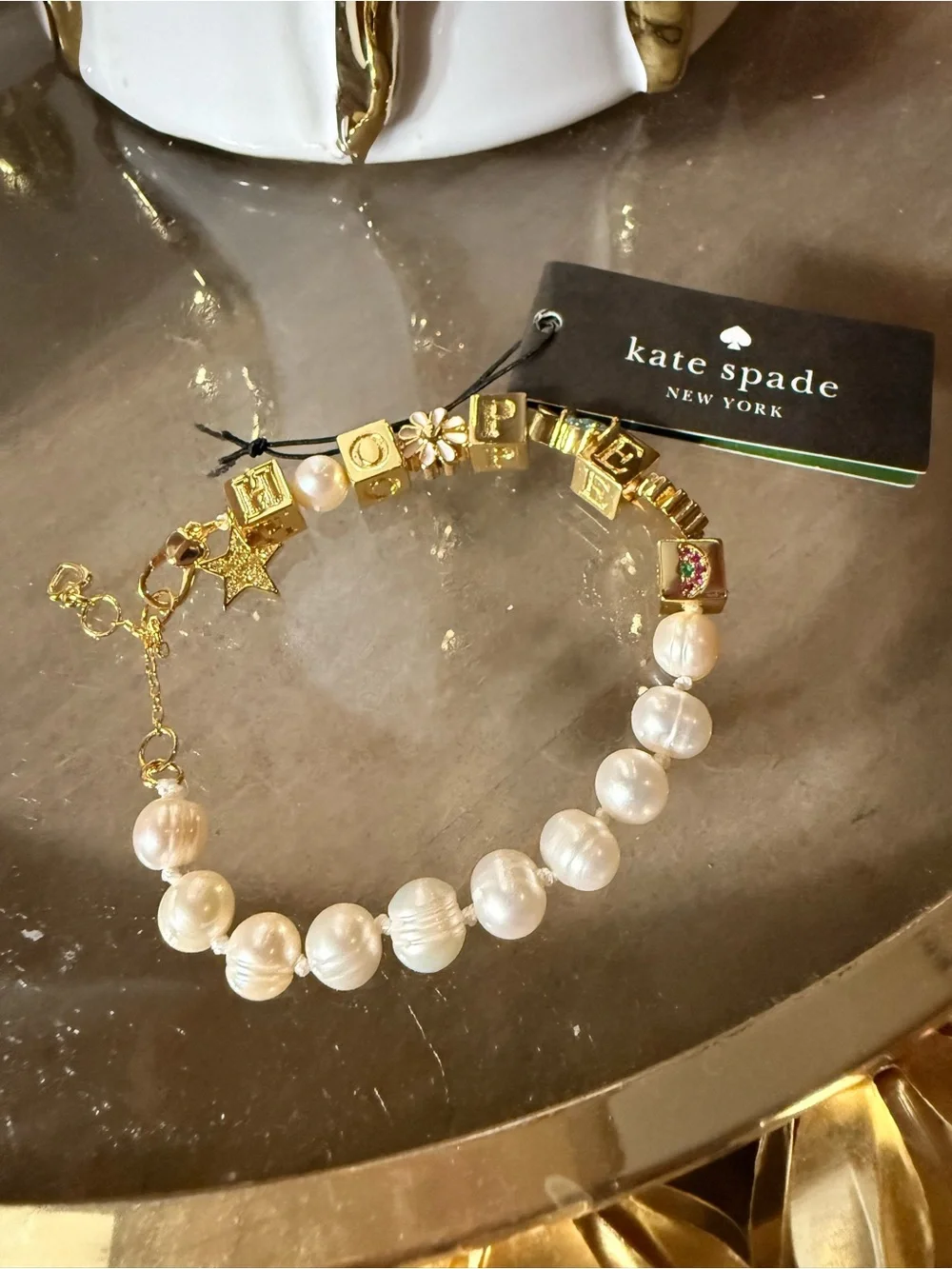 kate spade Gold Pearl & Charm HOPE Bracelet